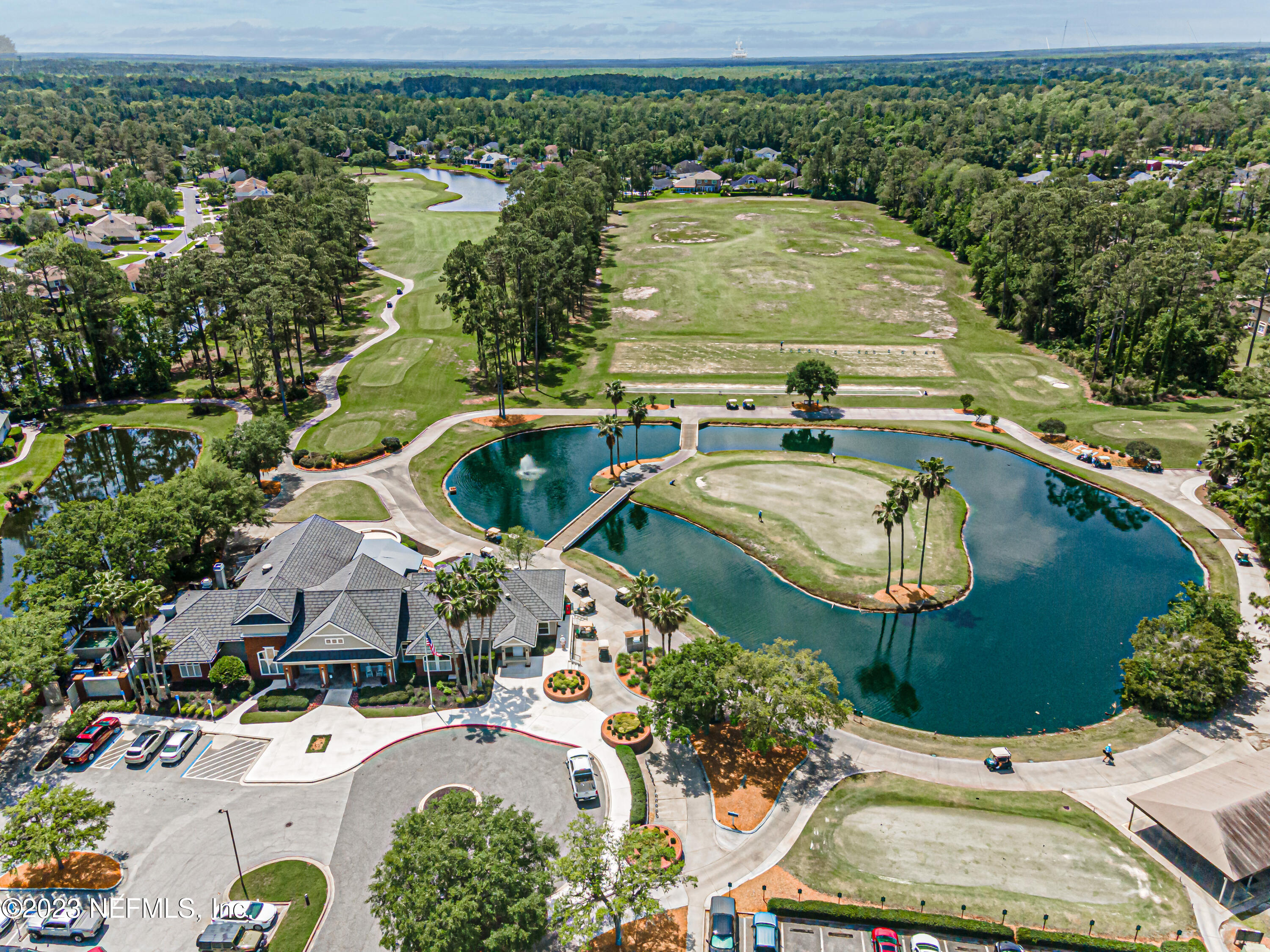 1614 Pinecrest Drive Fleming Island, FL 32003 - Photo 56 of 86 an aerial view of a house with swimming pool