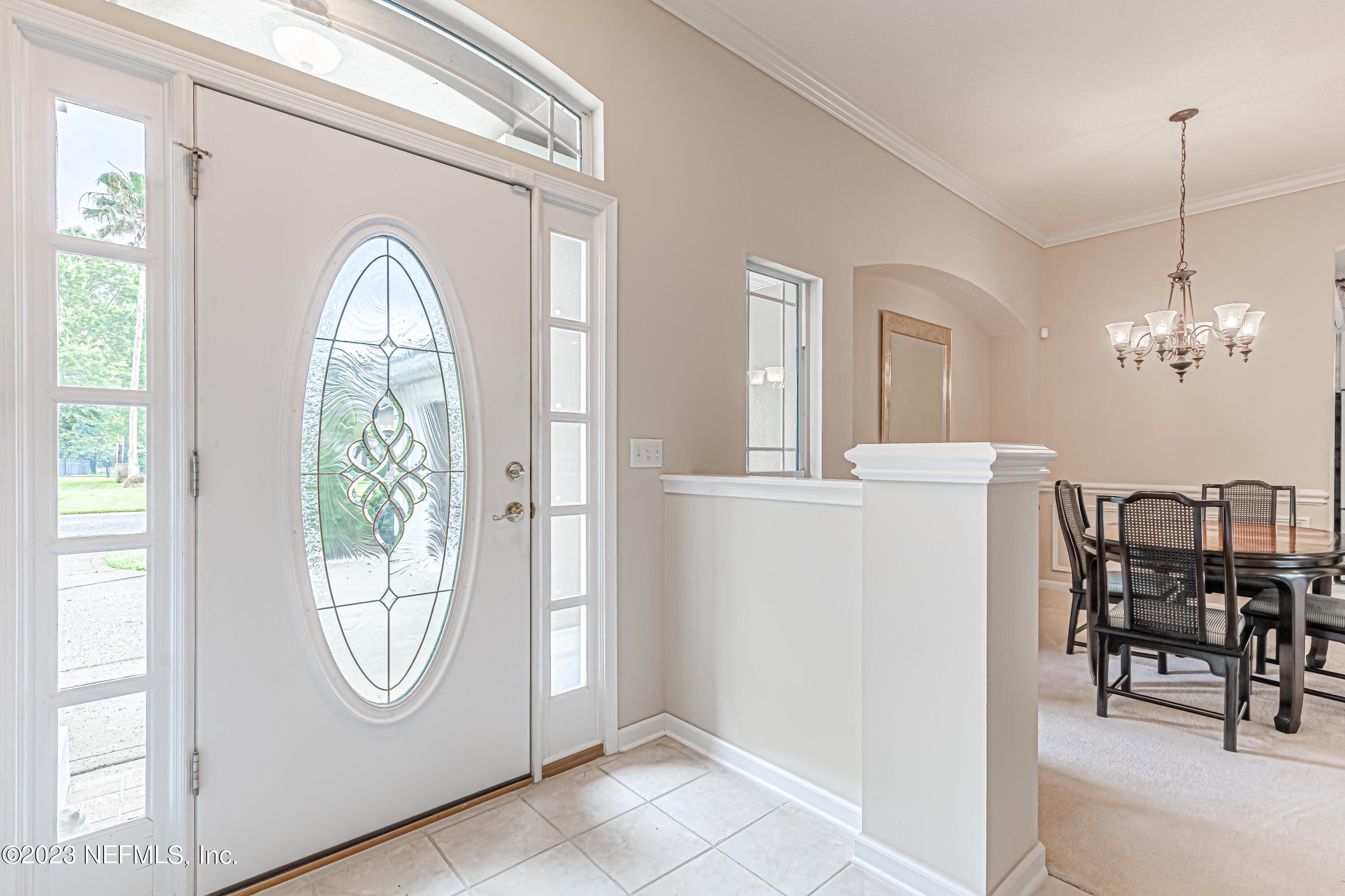 1614 Pinecrest Drive Fleming Island, FL 32003 - Photo 6 of 86 a view of a livingroom with furniture mirror and window
