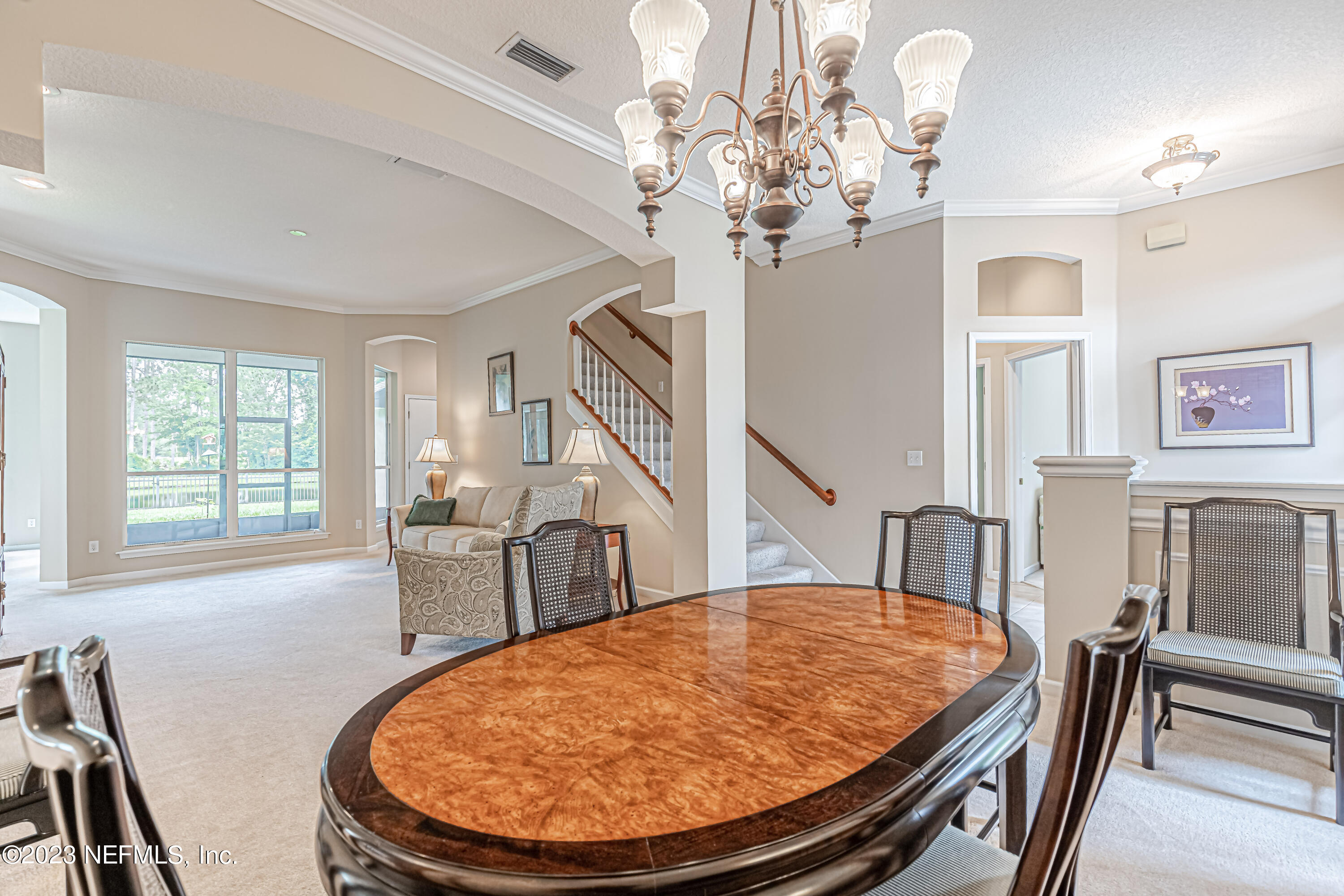 1614 Pinecrest Drive Fleming Island, FL 32003 - Photo 8 of 86 a view of a livingroom with furniture window and wooden floor