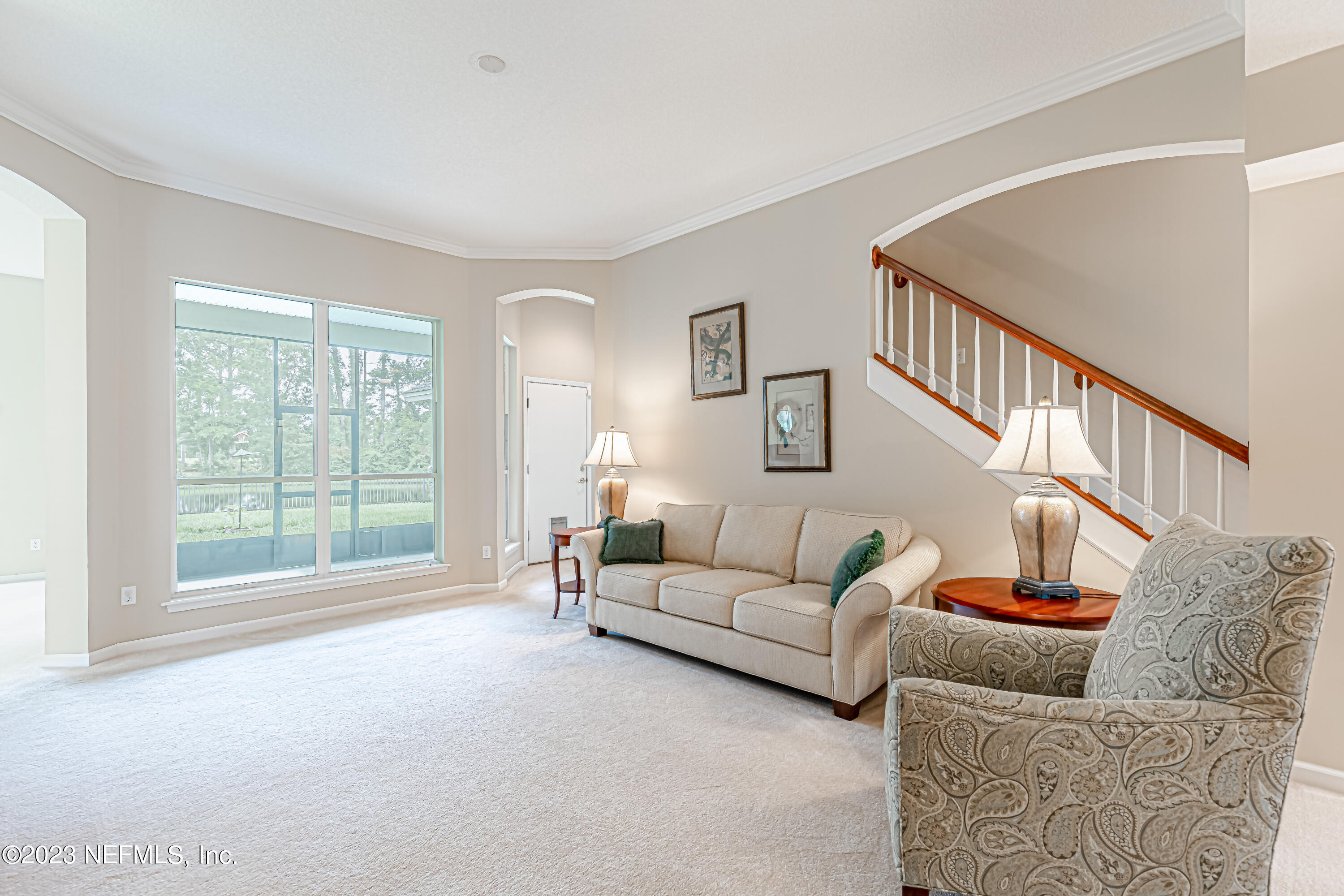 1614 Pinecrest Drive Fleming Island, FL 32003 - Photo 9 of 86 a living room with furniture and a large window