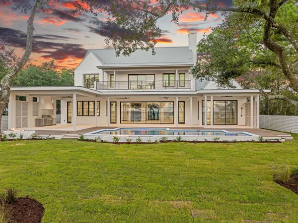 a front view of a house with swimming pool