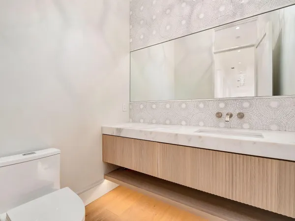 a bathroom with a sink and a toilet