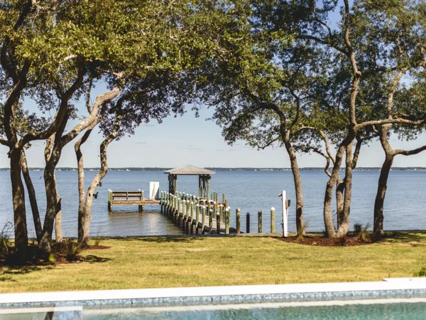 a view of a house with swimming pool