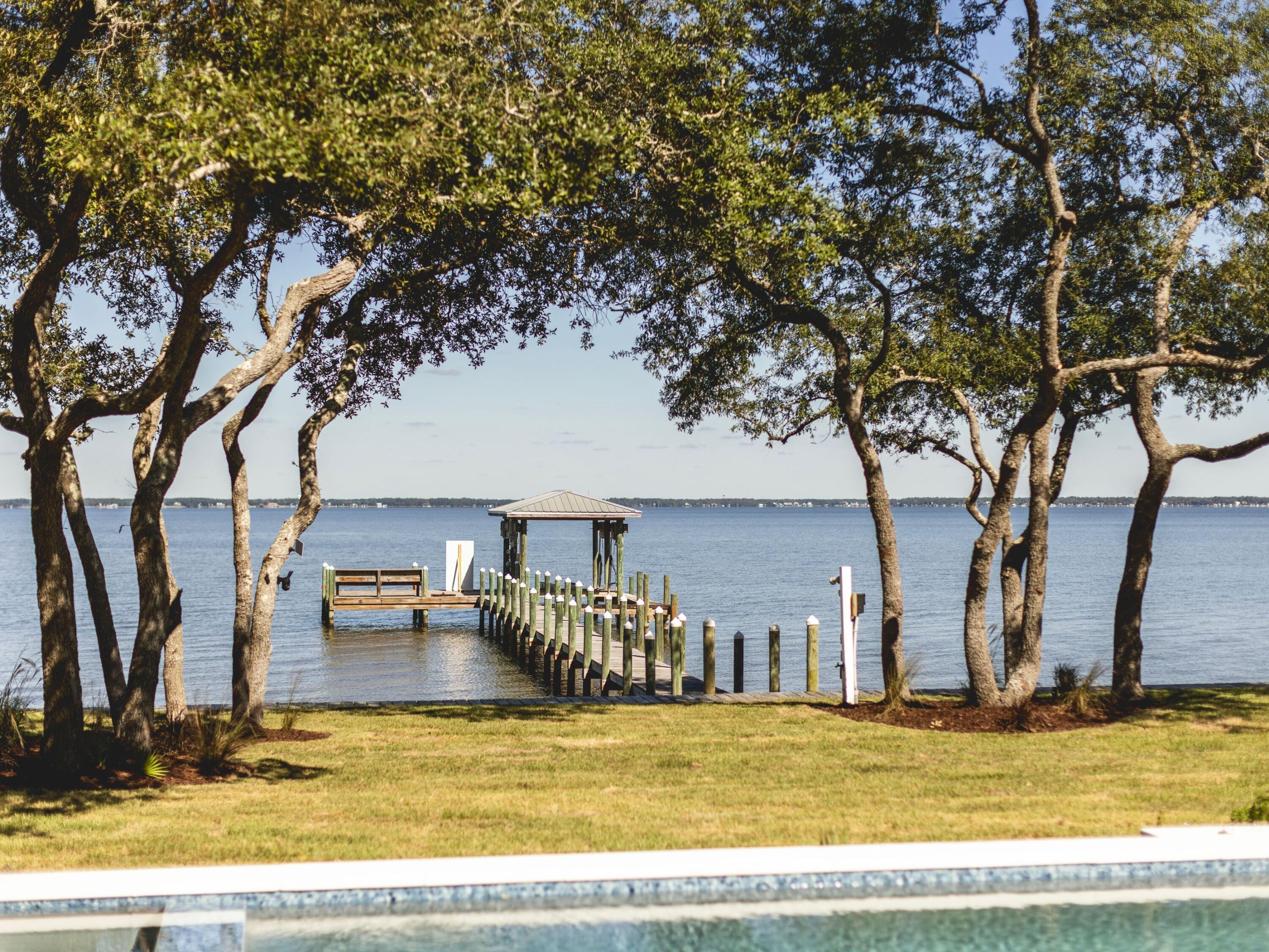 431 Pisces Drive Santa Rosa Beach, FL 32459 - Photo 4 of 48 a view of a house with swimming pool
