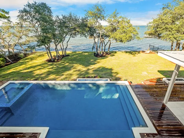 a view of an outdoor space with swimming pool