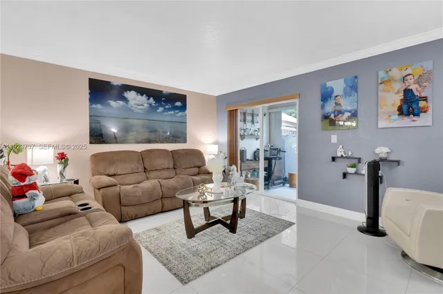 a living room with furniture and a couch