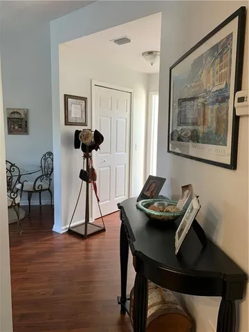 a dining room with a table and chairs