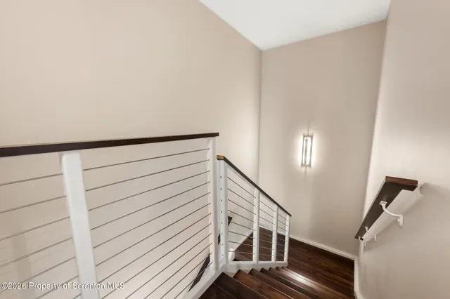 a view of a kitchen with a sink and a window
