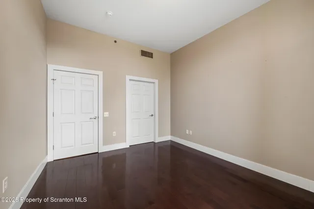 a view of an empty walk in closet