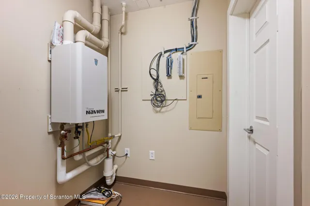 a view of a swimming pool with outdoor seating