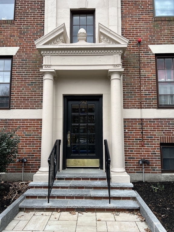 1982 Commonwealth Avenue, Unit 5 Boston, MA 02135 - Photo 5 of 5 a front view of a house with stairs