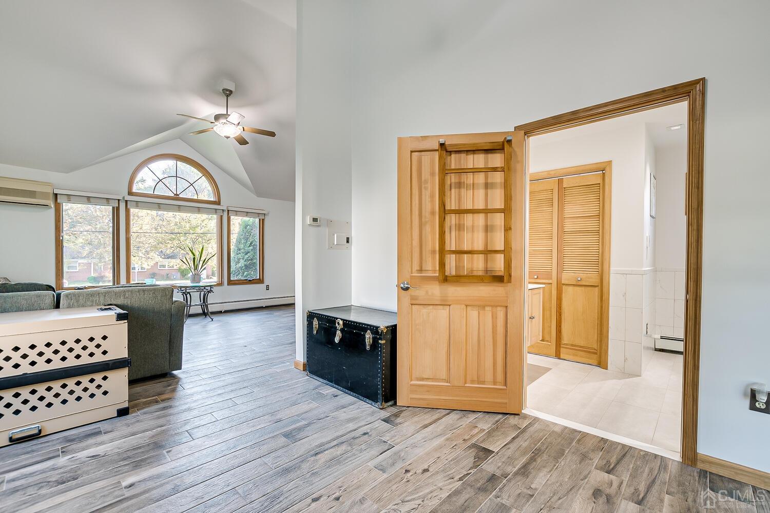 37 Utica Road Edison, NJ 08820 - Photo 22 of 53 a view of a livingroom with furniture window and wooden floor
