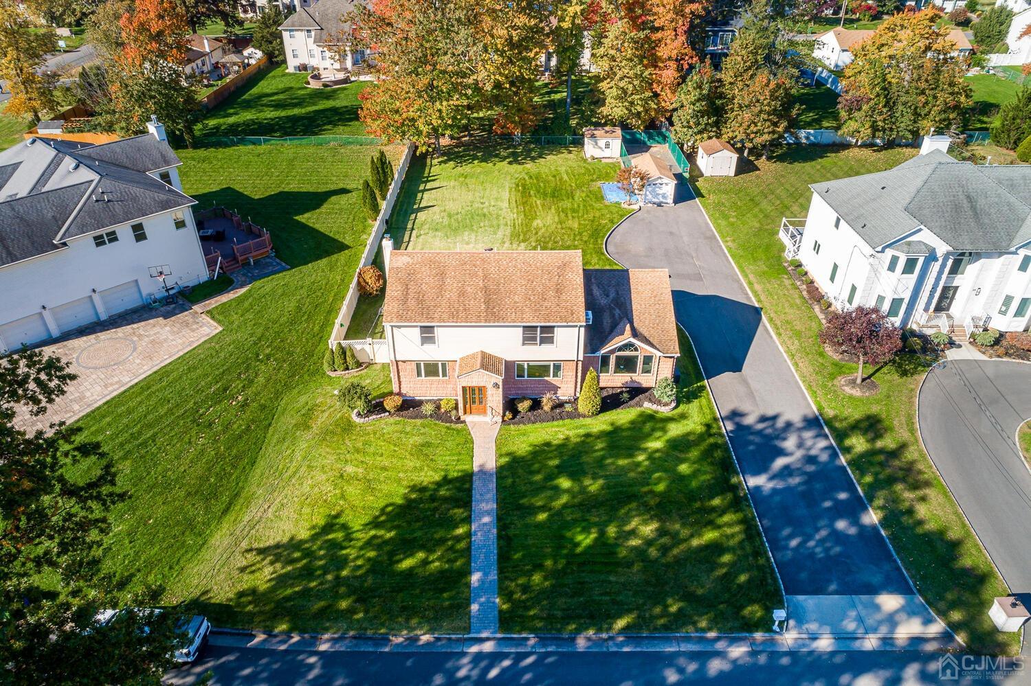 37 Utica Road Edison, NJ 08820 - Photo 3 of 53 an aerial view of a house with garden space and street view