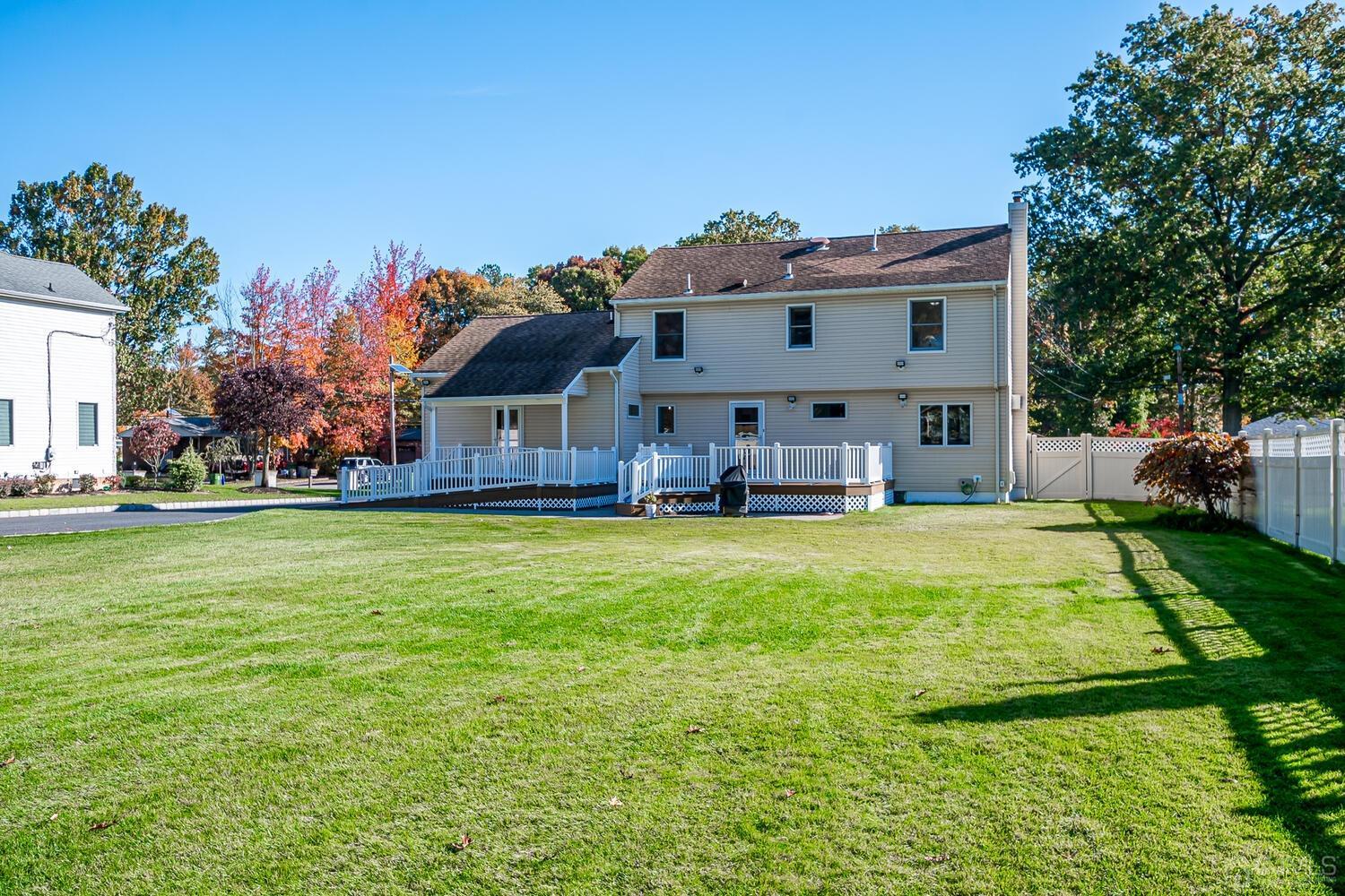 37 Utica Road Edison, NJ 08820 - Photo 48 of 53 a front view of house with outdoor space and swimming pool