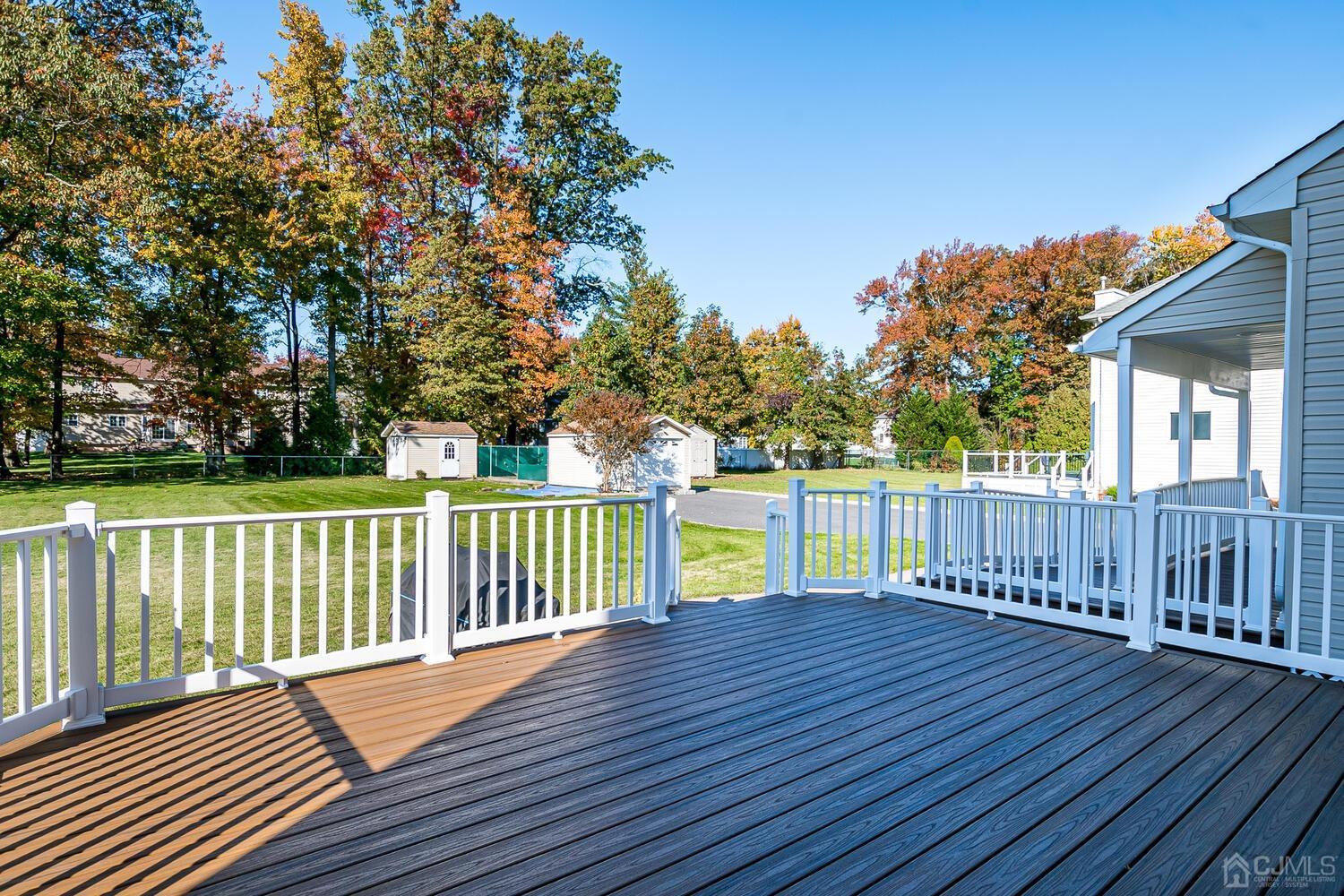 37 Utica Road Edison, NJ 08820 - Photo 49 of 53 a view of deck with wooden floor and fence