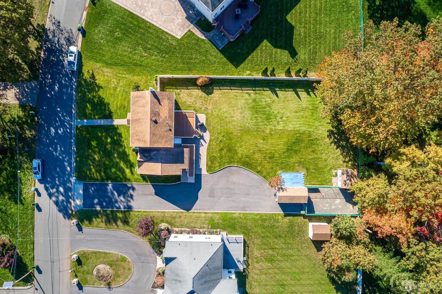 37 Utica Road Edison, NJ 08820 - Photo 5 of 53 an aerial view of a house with swimming pool garden and patio
