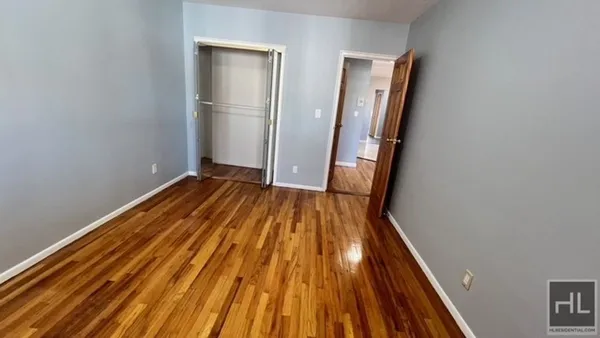 a bathroom with a shower a sink and a toilet