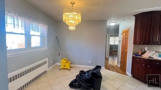 a room with furniture and a window