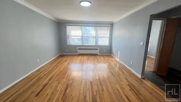 a room with furniture and a window