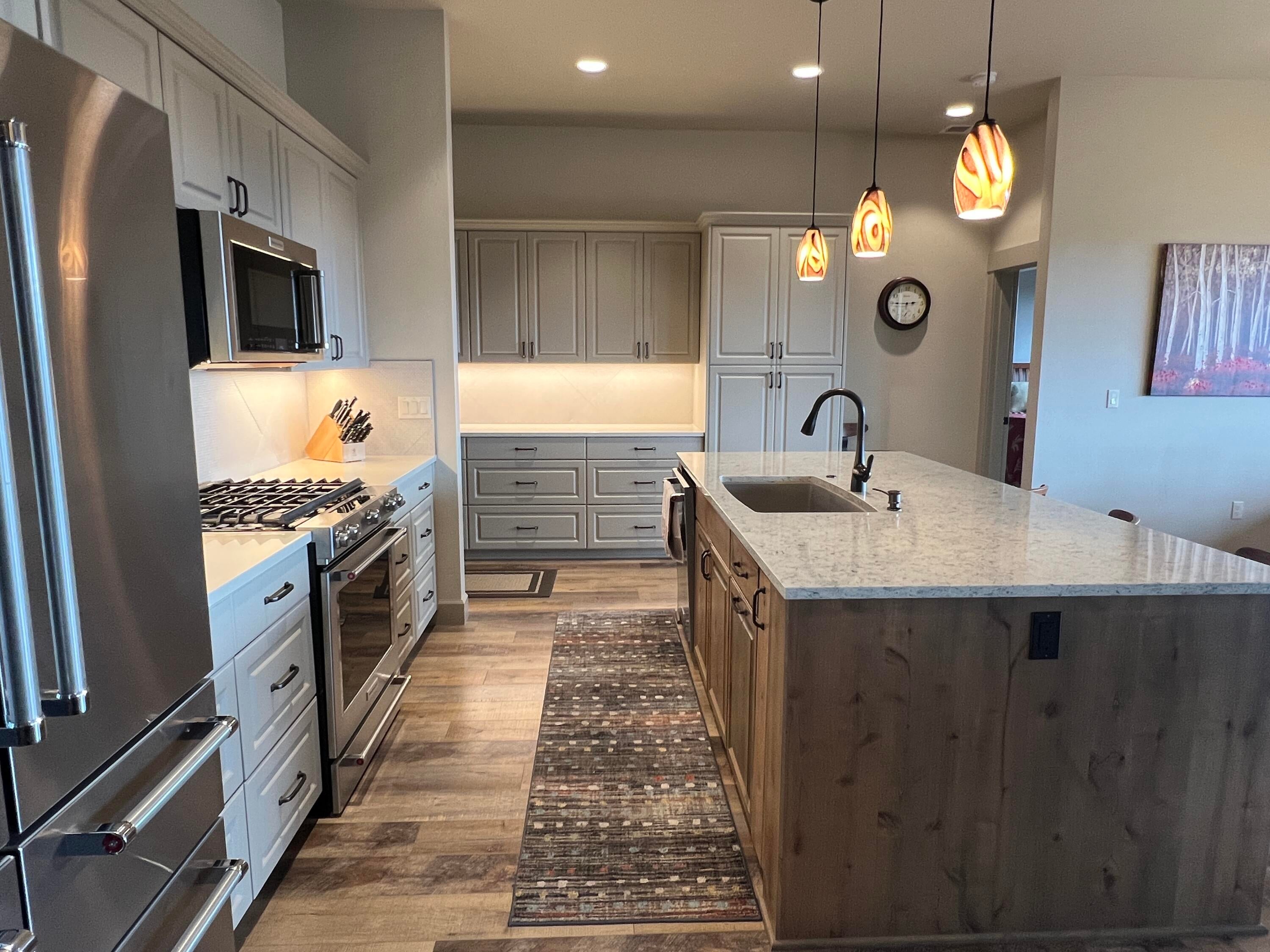 3405 Southwest 45th Street Redmond, OR 97756 - Photo 58 of 76 Stainless steel appliances, gas range, quartz & butler's pantry & more not shown yet