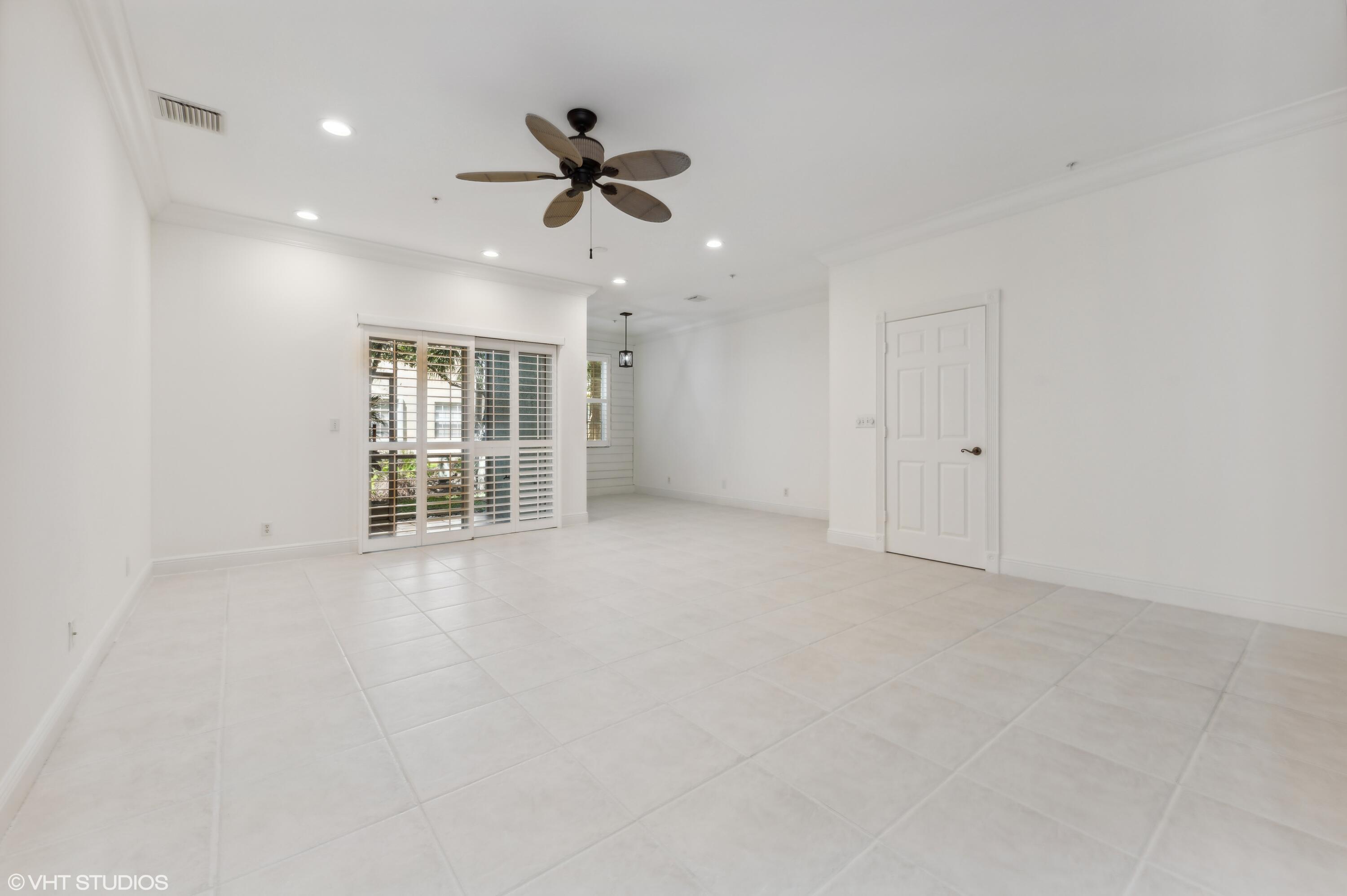 103 Lighthouse Circle, Unit D Tequesta, FL 33469 - Photo 6 of 36 a view of an empty room with a window
