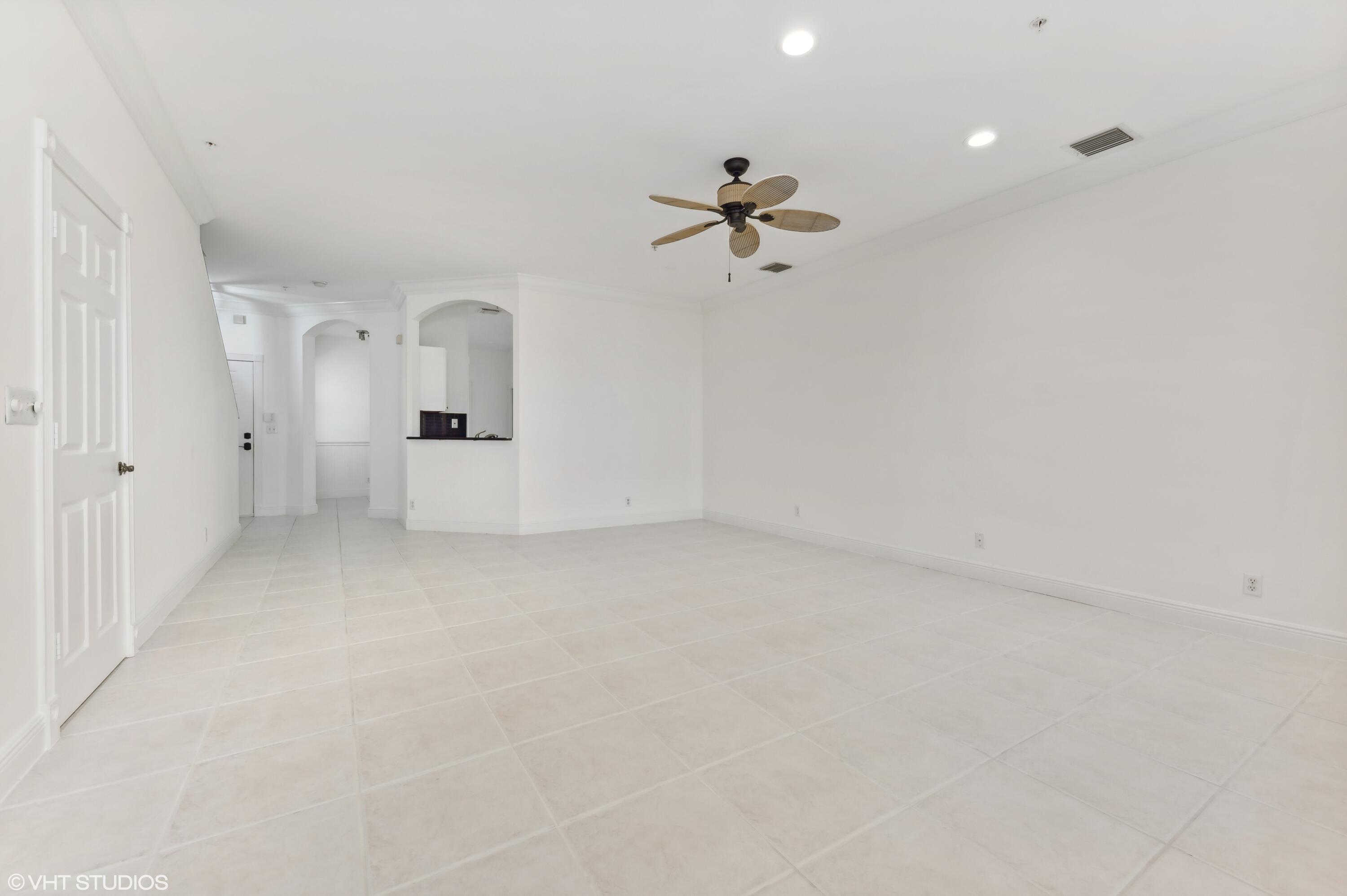 103 Lighthouse Circle, Unit D Tequesta, FL 33469 - Photo 10 of 36 a view of a livingroom with a bathtub