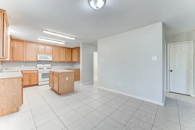 a kitchen with a white cabinets