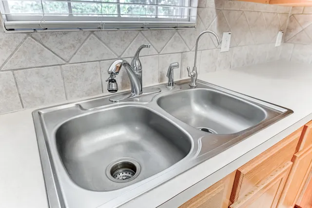 a close view of sink and window