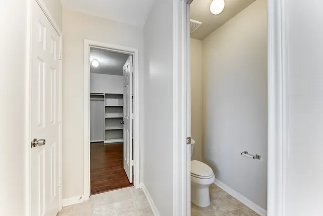 a bathroom with a granite countertop sink