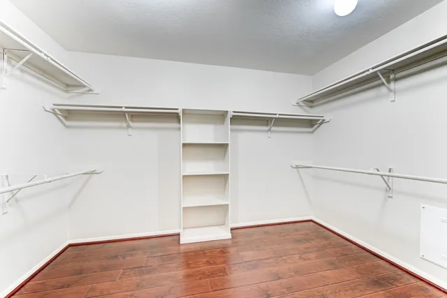 a view of an empty walk in closet