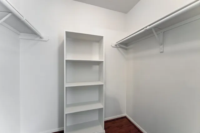 a view of an empty walk in closet