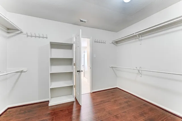 a view of an empty walk in closet
