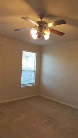 a view of table and chair in a room