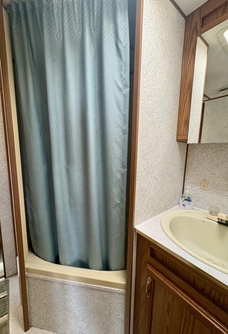 5-498 Woodhaven Sublette, IL 61367 - Photo 17 of 22 a bathroom with a sink and vanity