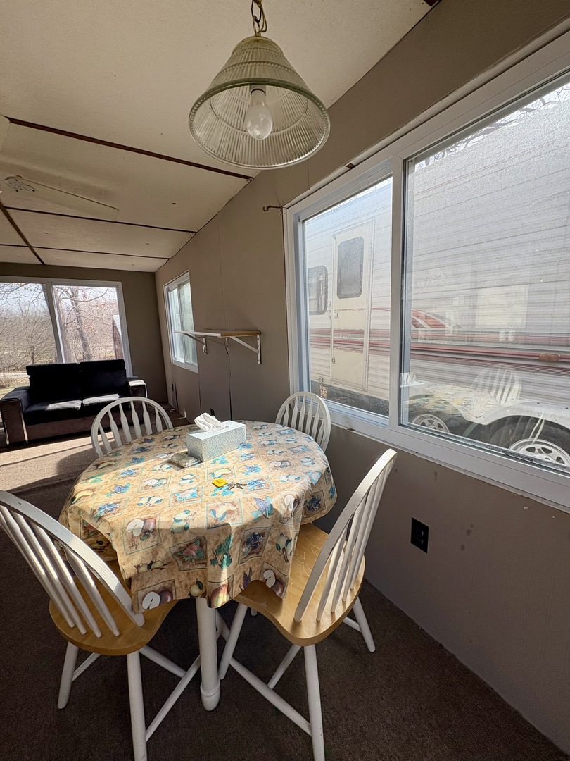 5-498 Woodhaven Sublette, IL 61367 - Photo 20 of 22 a dining room with furniture and window