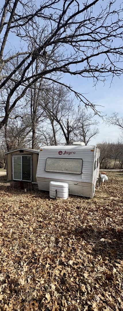 5-498 Woodhaven Sublette, IL 61367 - Photo 3 of 22 a view of a backyard of a house