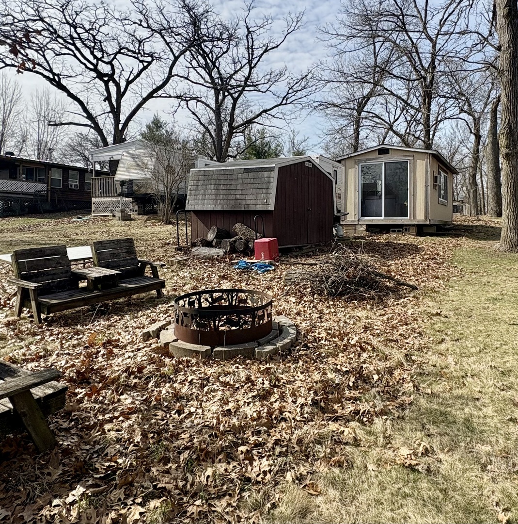 5-498 Woodhaven Sublette, IL 61367 - Photo 4 of 22 a large tree in front of a house