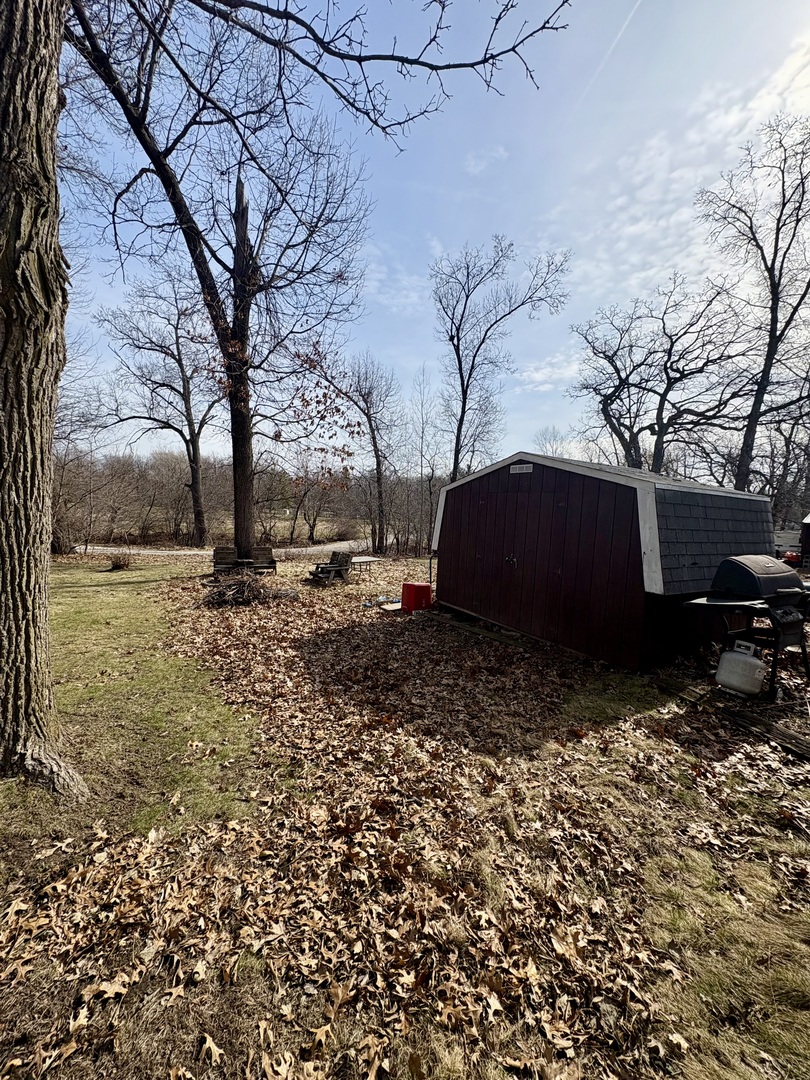 5-498 Woodhaven Sublette, IL 61367 - Photo 5 of 22 a view of house with a yard
