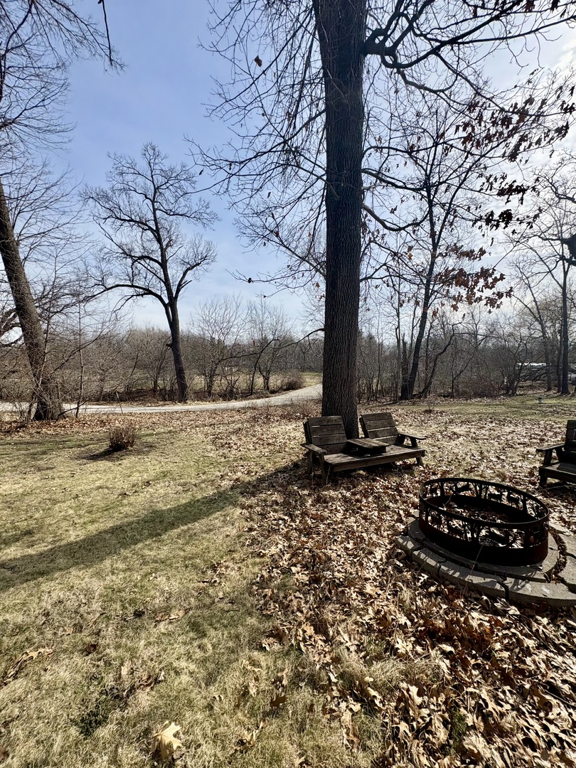 5-498 Woodhaven Sublette, IL 61367 - Photo 6 of 22 a view of a yard with a tree