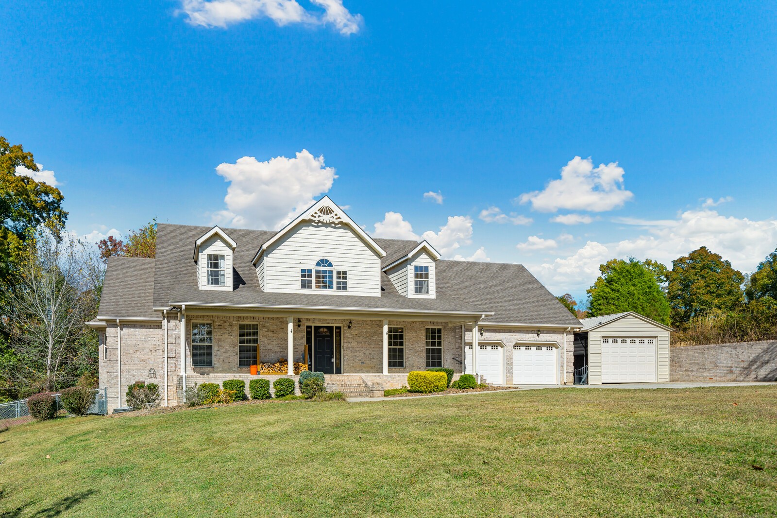 434 Alexander Road Estill Springs, TN 37330 - Photo 3 of 64 a front view of a house with a garden
