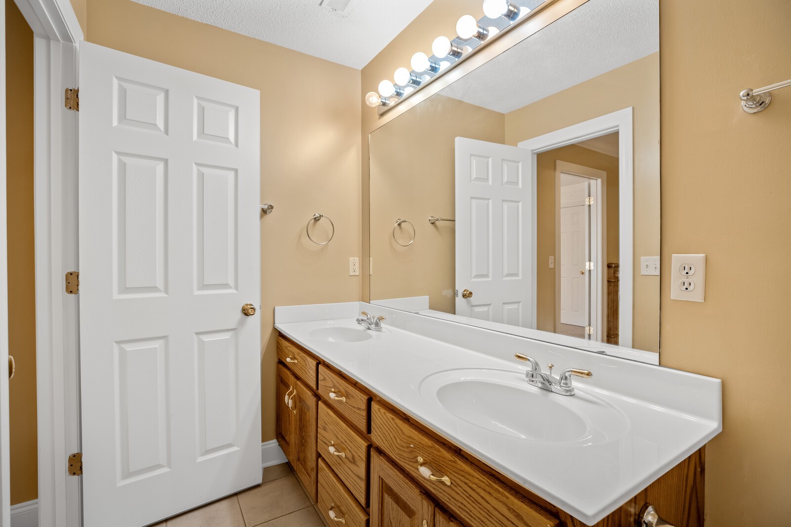 434 Alexander Road Estill Springs, TN 37330 - Photo 34 of 64 a bathroom with a sink double vanity and a mirror