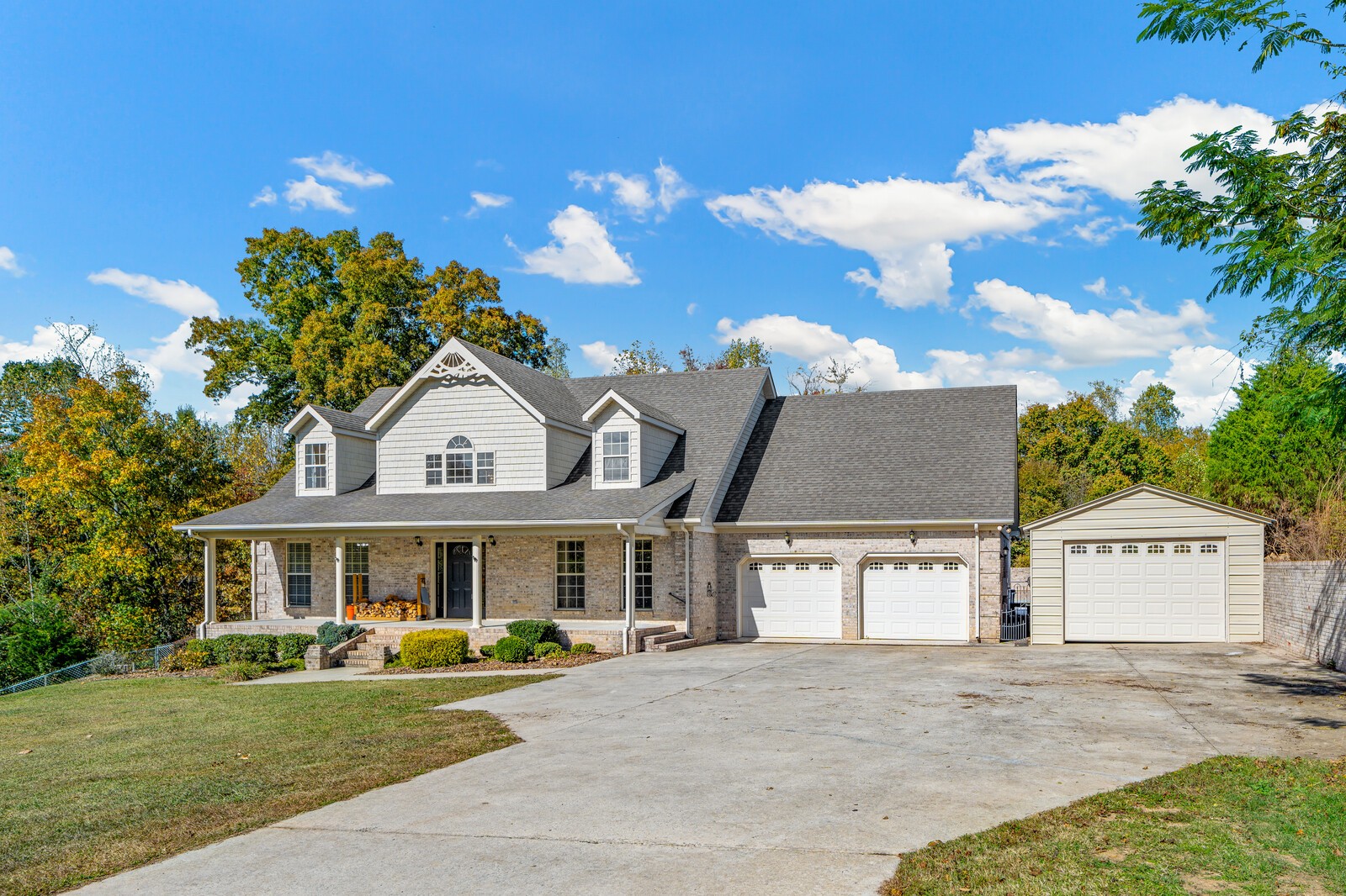 434 Alexander Road Estill Springs, TN 37330 - Photo 4 of 64 a front view of a house with a yard and garage
