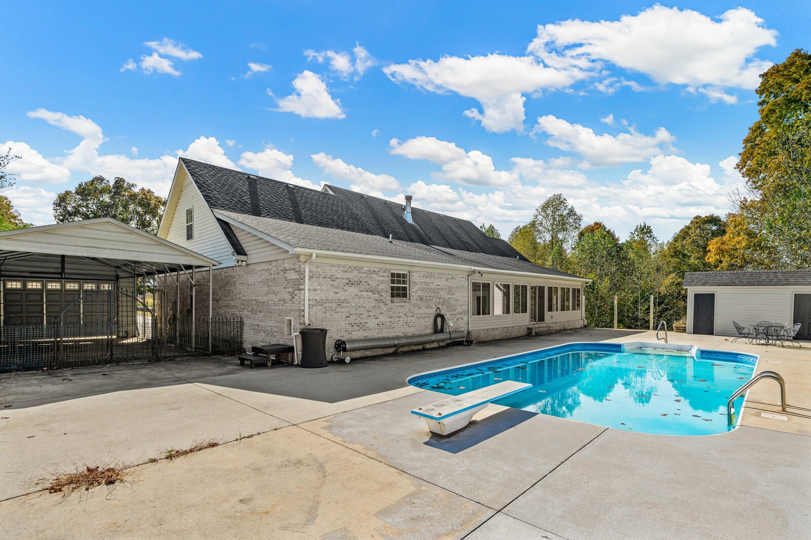 434 Alexander Road Estill Springs, TN 37330 - Photo 44 of 64 a view of a house with pool and chairs