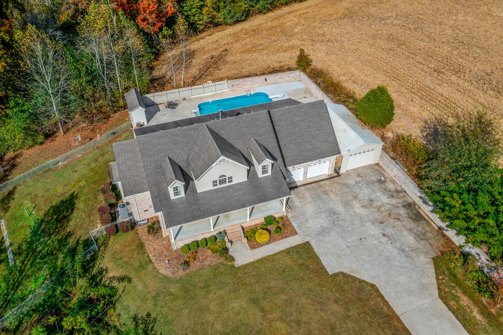 434 Alexander Road Estill Springs, TN 37330 - Photo 45 of 64 an aerial view of a house with a swimming pool