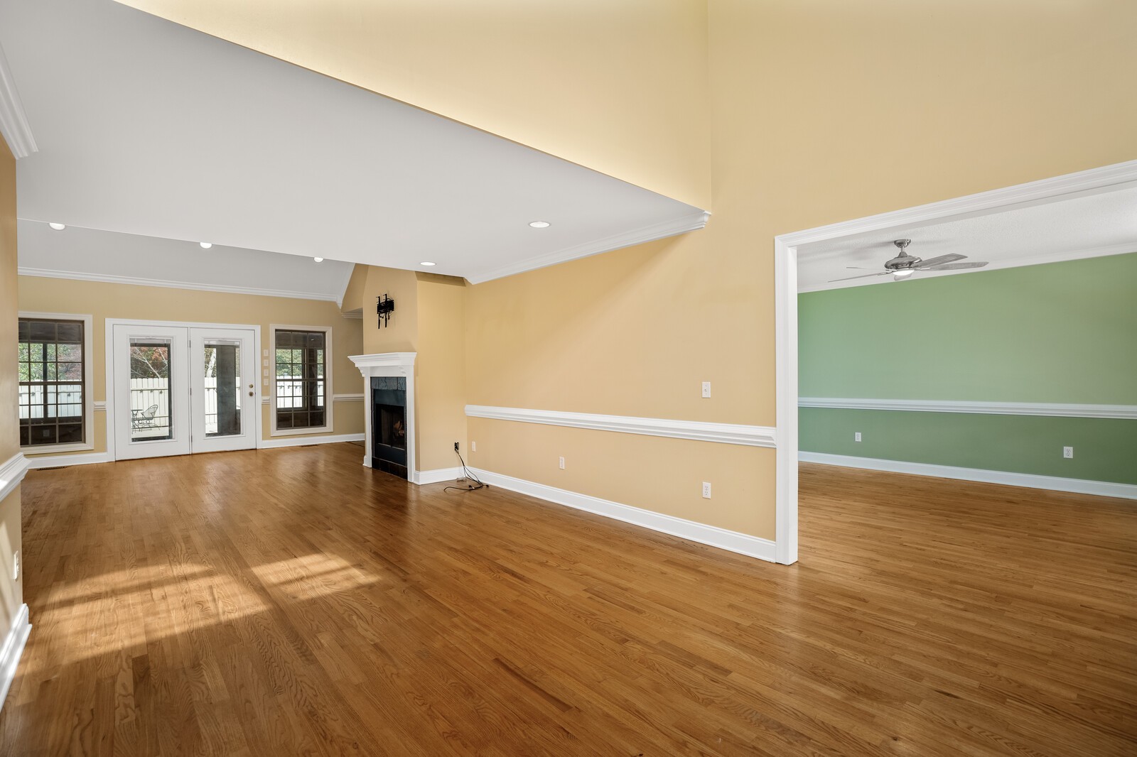 434 Alexander Road Estill Springs, TN 37330 - Photo 8 of 64 a view of an empty room with window and wooden floor