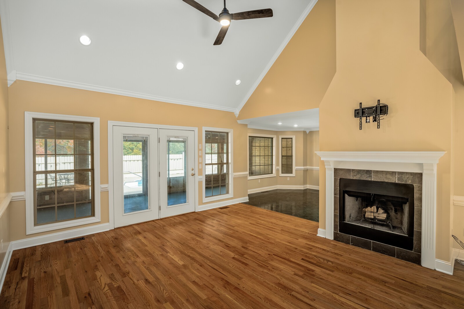 434 Alexander Road Estill Springs, TN 37330 - Photo 9 of 64 a view of an empty room with a fireplace and a window