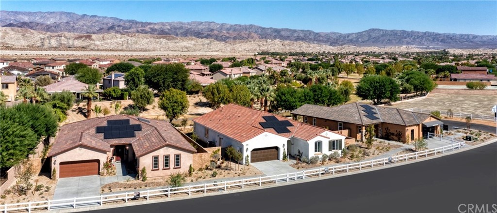 82066 Verdi Road Indio, CA 92203 - Photo 14 of 18 an aerial view of residential houses with outdoor space