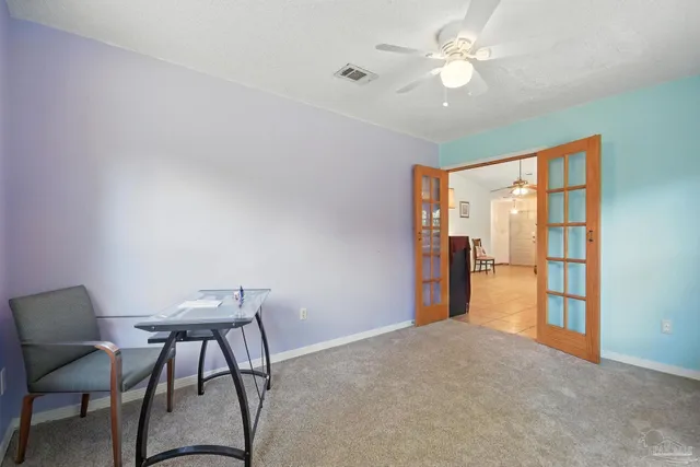 a view of a kitchen with furniture and a kitchen