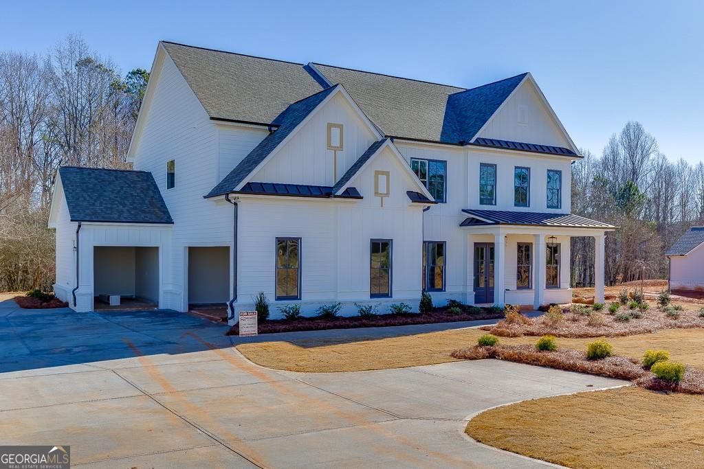 5470 Settingdown Road Cumming, GA 30028 - Photo 2 of 46 a front view of multiple houses with yard