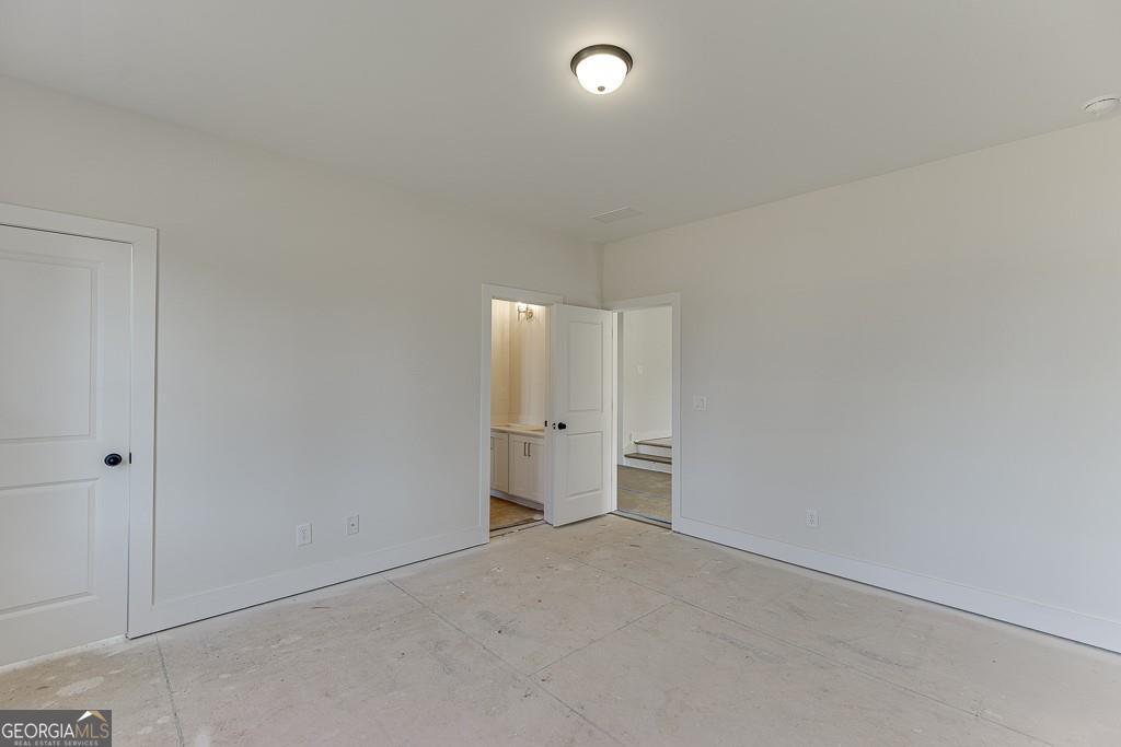 5470 Settingdown Road Cumming, GA 30028 - Photo 31 of 46 wooden floor and cabinet in a room